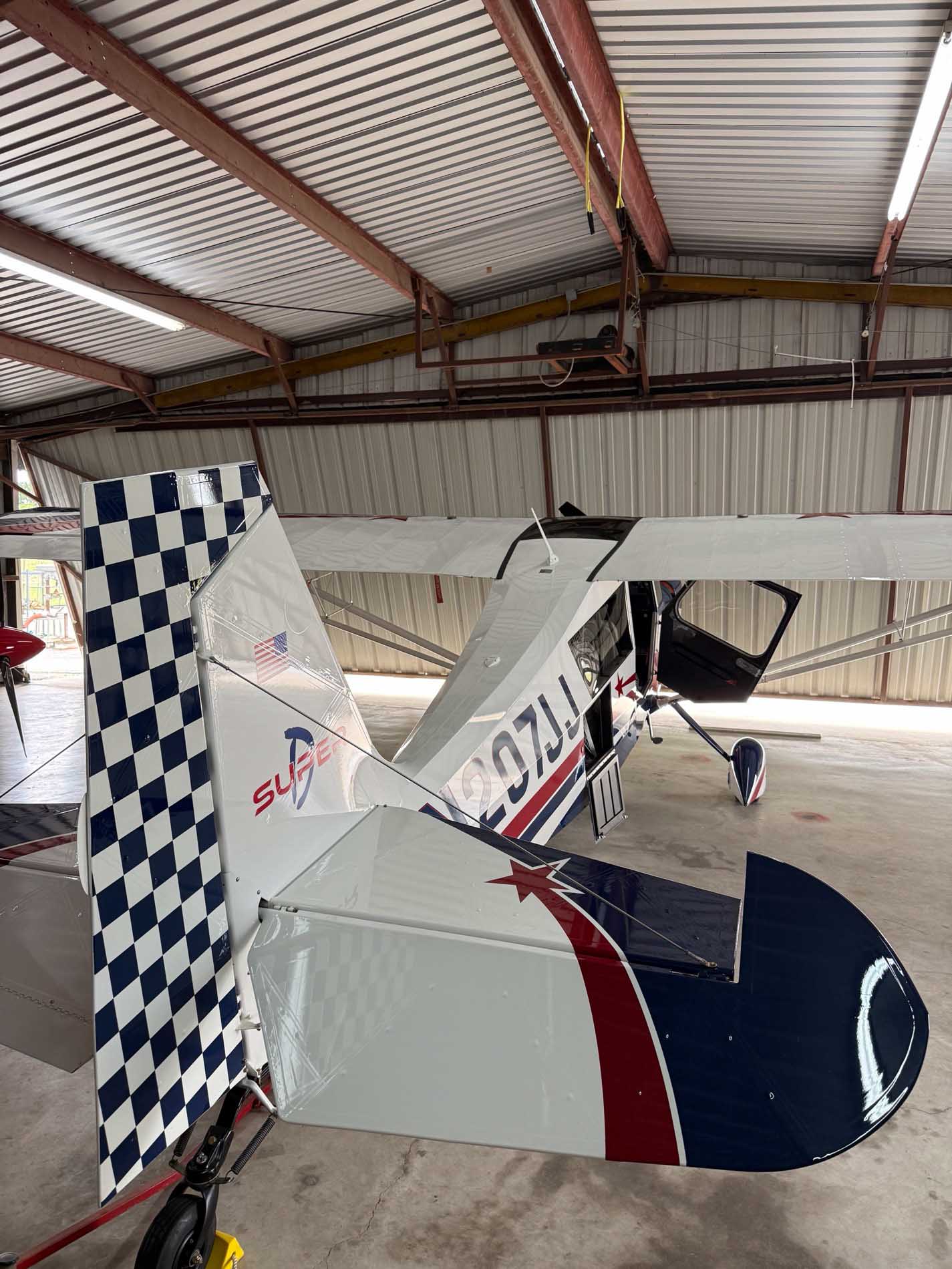 Super Decathlon N207JJ — checkered tail