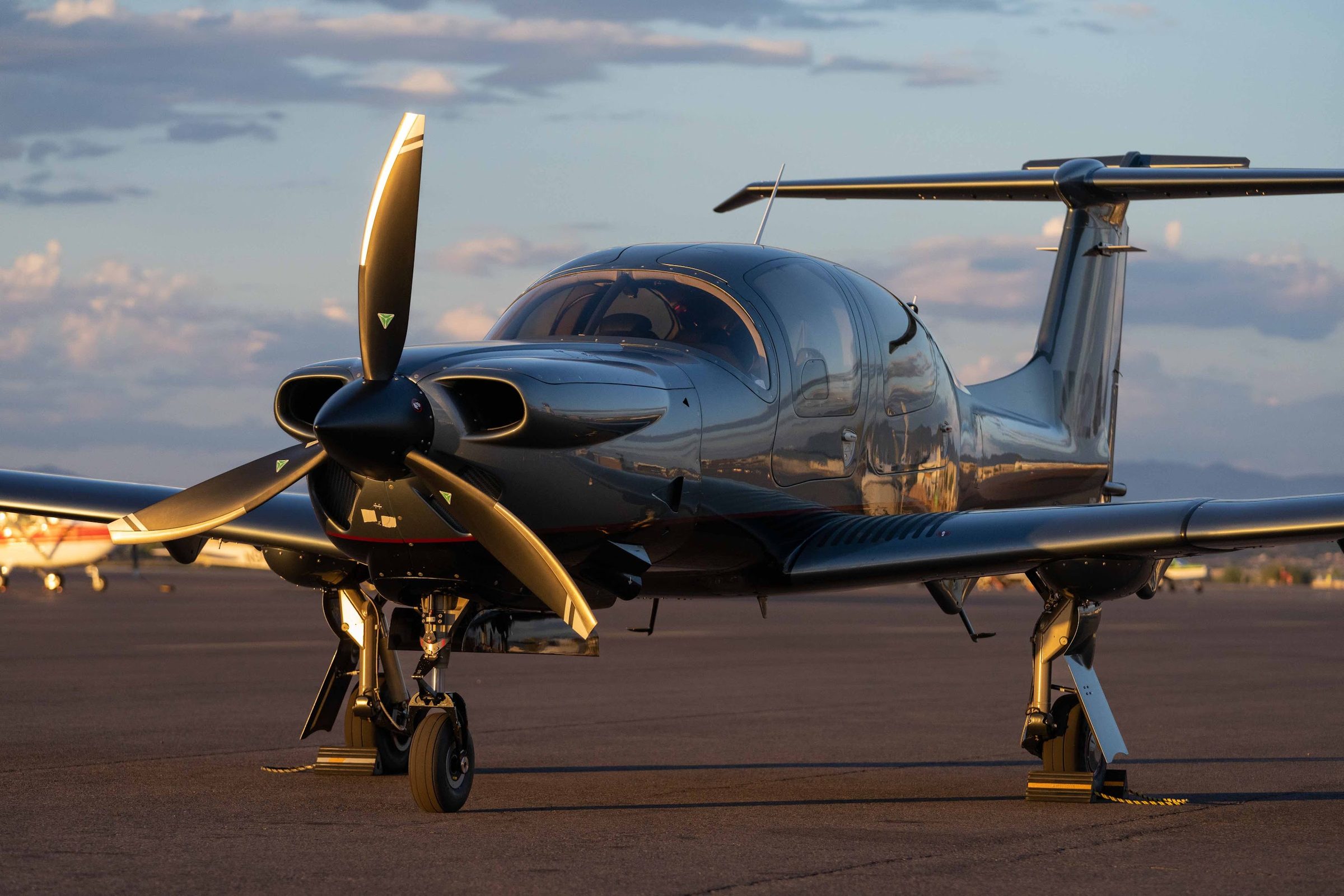 Flight Stars Diamond DA50 RG on the ramp at golden hour